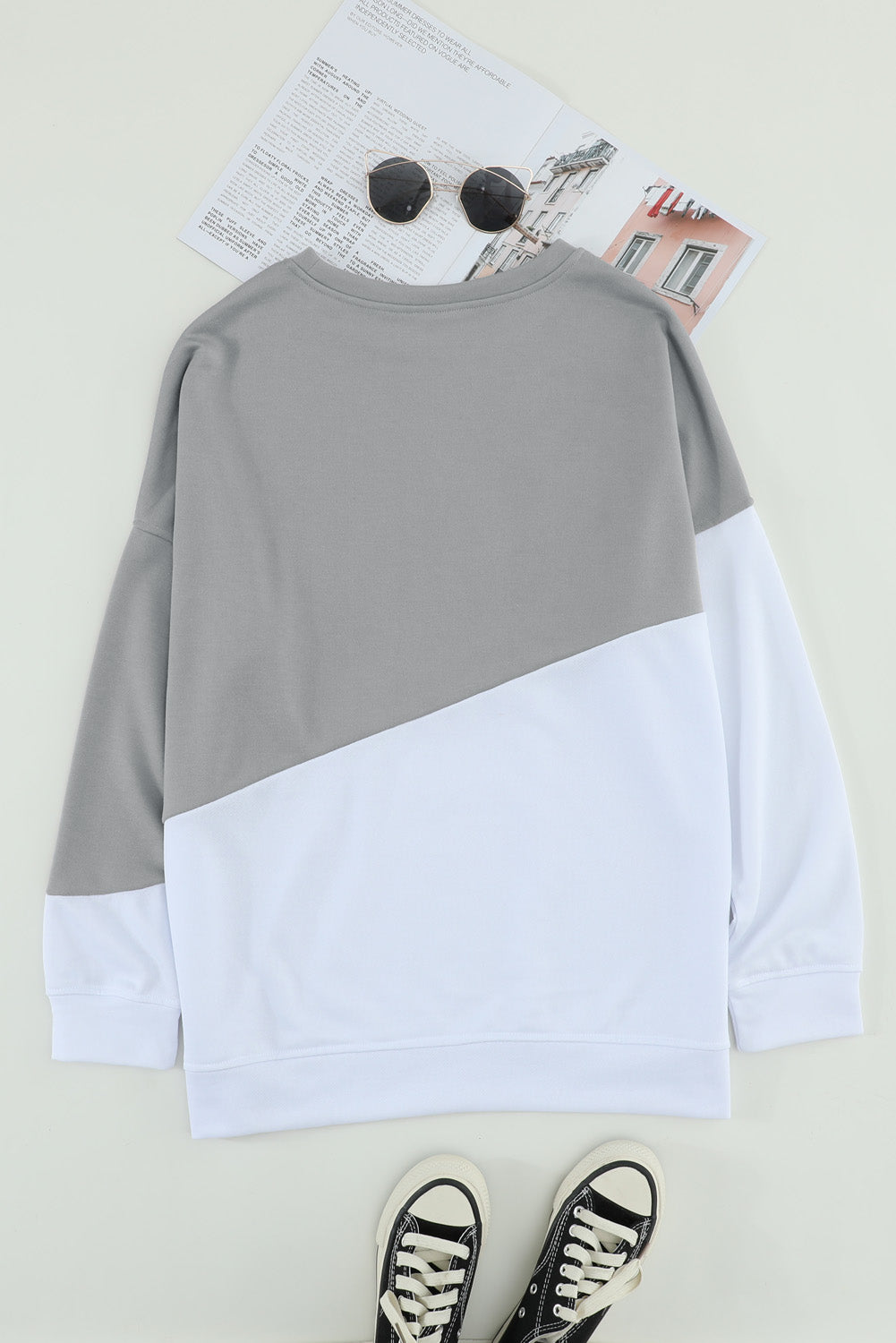 Light Blue Patchwork Dropped Shoulder Sweatshirt with color block design, showcasing a relaxed fit and soft fabric texture.