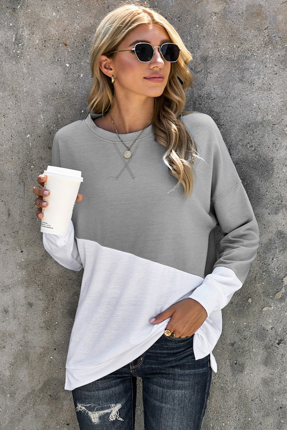 Light Blue Patchwork Dropped Shoulder Sweatshirt with color block design, showcasing a relaxed fit and soft fabric texture.