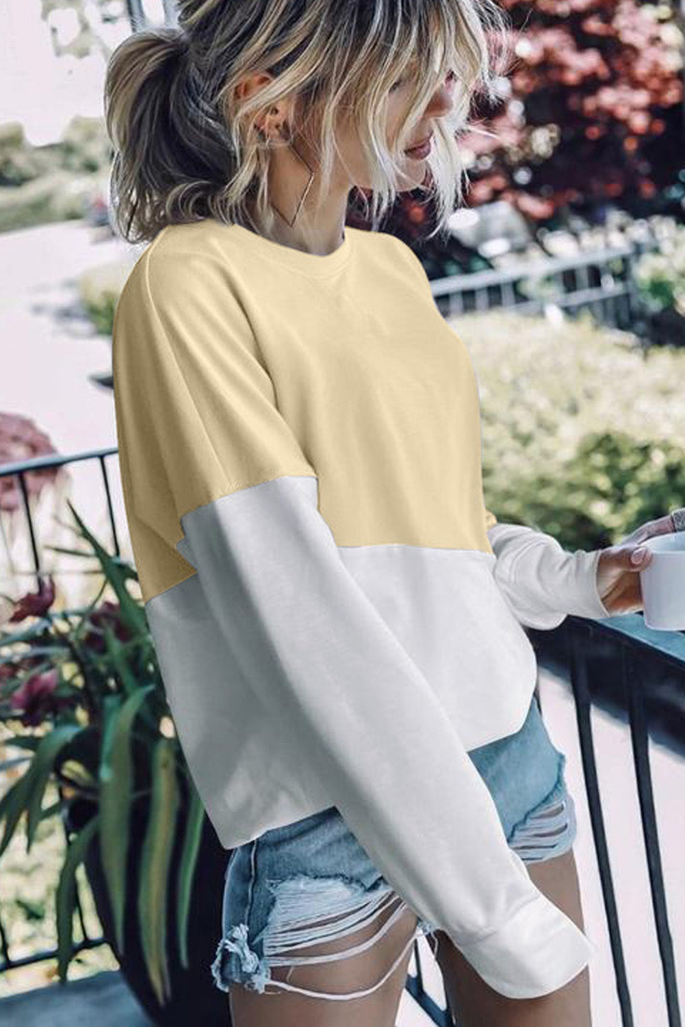 Light Blue Patchwork Dropped Shoulder Sweatshirt with color block design, showcasing a relaxed fit and soft fabric texture.