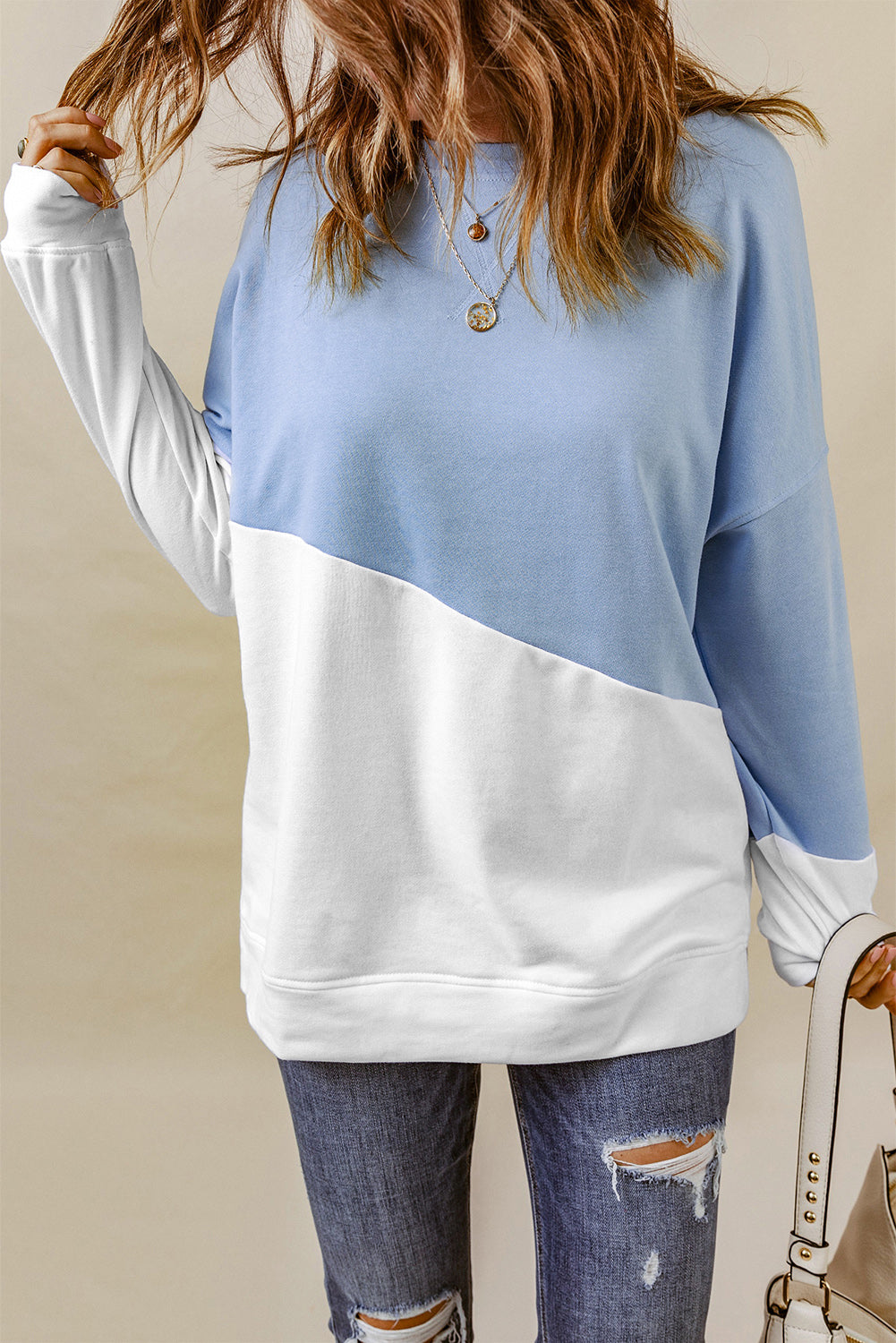 Light Blue Patchwork Dropped Shoulder Sweatshirt with color block design, showcasing a relaxed fit and soft fabric texture.