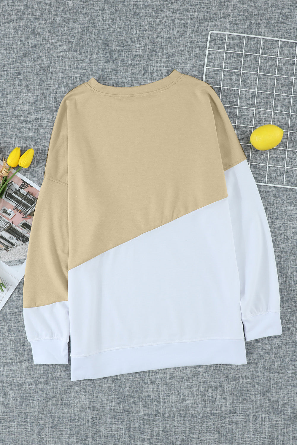 Light Blue Patchwork Dropped Shoulder Sweatshirt with color block design, showcasing a relaxed fit and soft fabric texture.