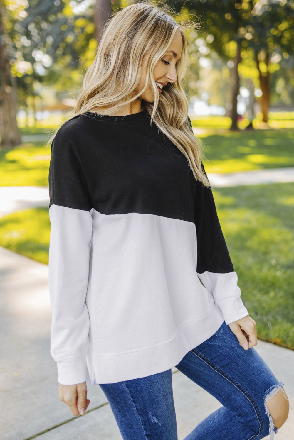 Light Blue Patchwork Dropped Shoulder Sweatshirt with color block design, showcasing a relaxed fit and soft fabric texture.