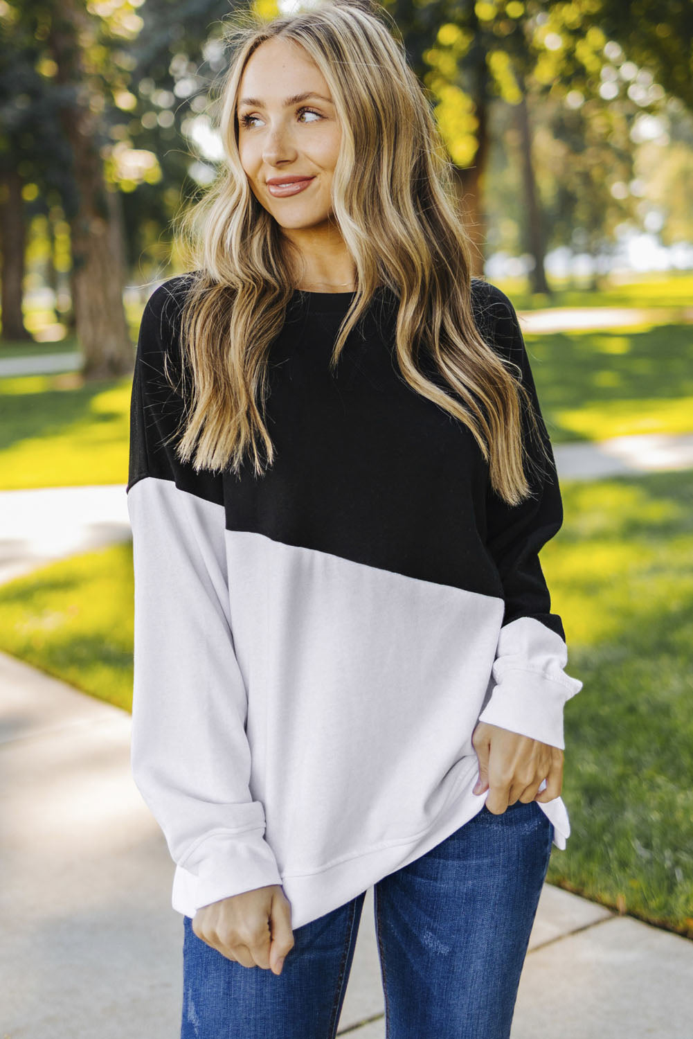 Light Blue Patchwork Dropped Shoulder Sweatshirt with color block design, showcasing a relaxed fit and soft fabric texture.