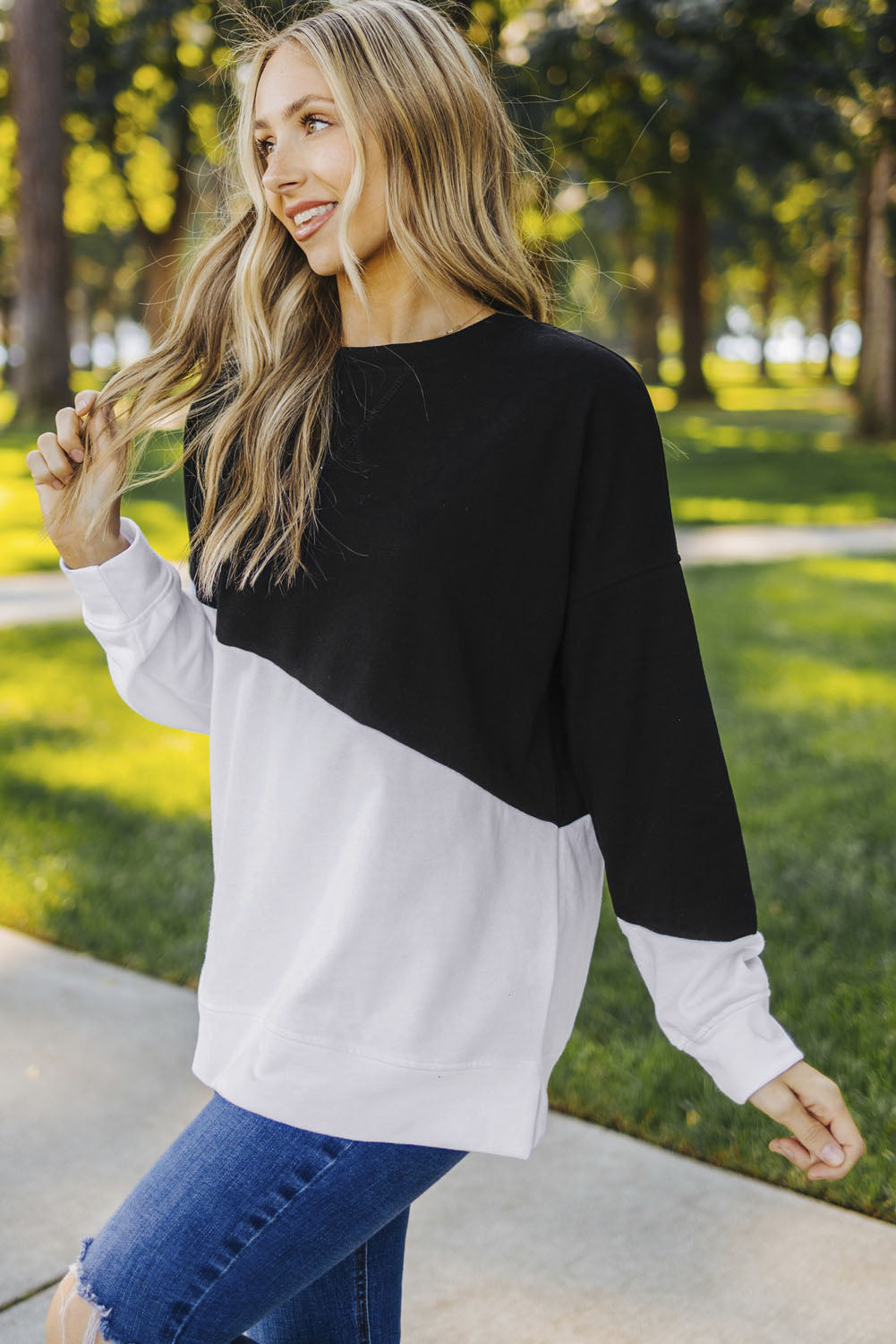 Light Blue Patchwork Dropped Shoulder Sweatshirt with color block design, showcasing a relaxed fit and soft fabric texture.