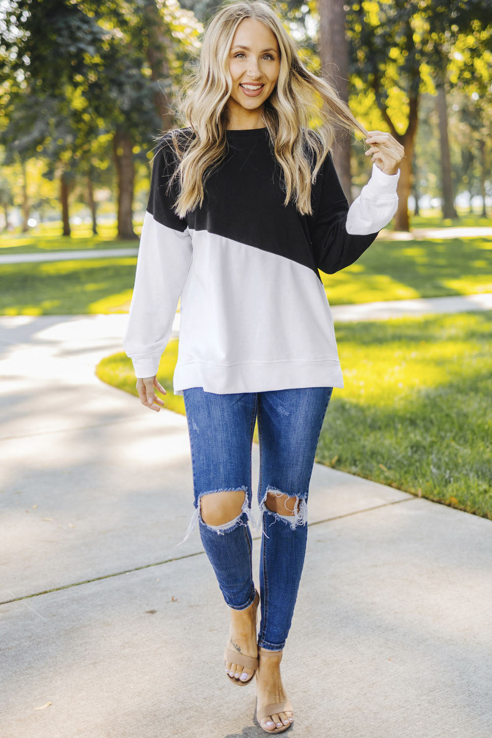 Light Blue Patchwork Dropped Shoulder Sweatshirt with color block design, showcasing a relaxed fit and soft fabric texture.