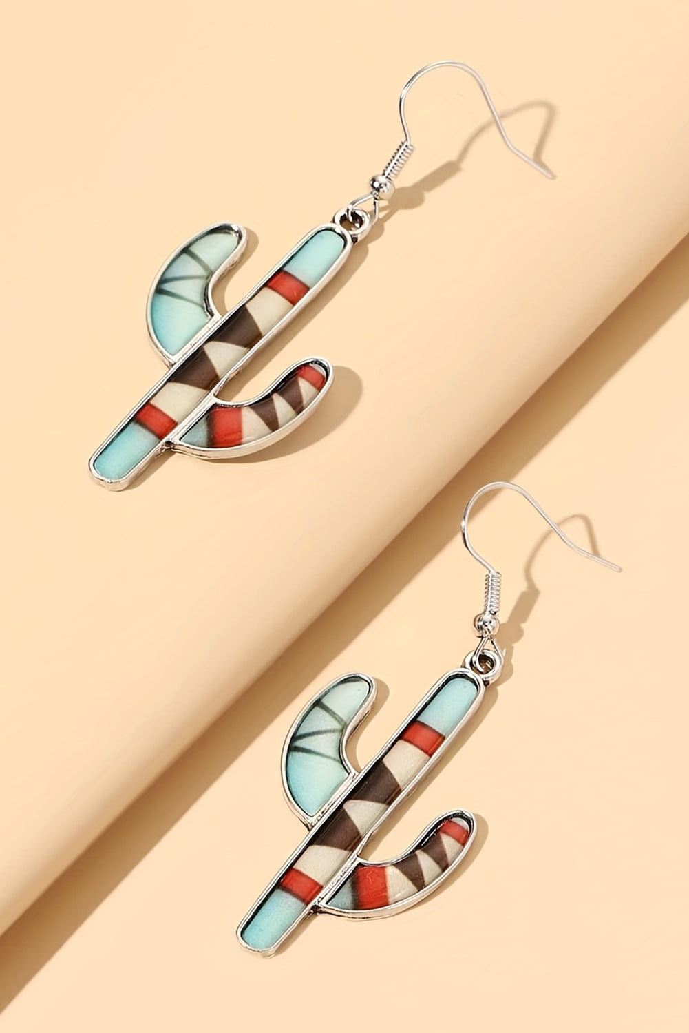 Light blue alloy dangle earrings featuring a cactus design, perfect for adding a trendy touch to any outfit.