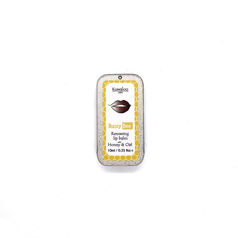 A 10ml tin of Honey & Oat Lip Balm, showcasing its natural ingredients and eco-friendly packaging.