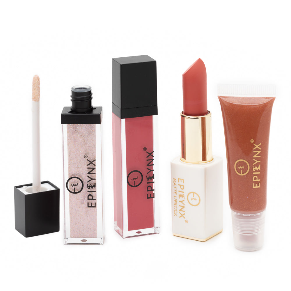 A vibrant set of vegan lip products including lip balm, lipsticks, and lip gloss in various colors, displayed elegantly.