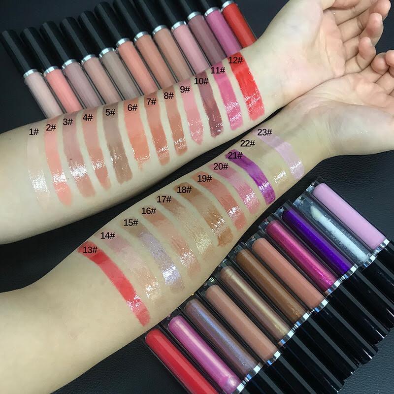 A collection of colorful Lip Gloss Tubes for the Lips of An Angel, showcasing various shades including blue, pink, nude, and red, designed for high-impact shine.