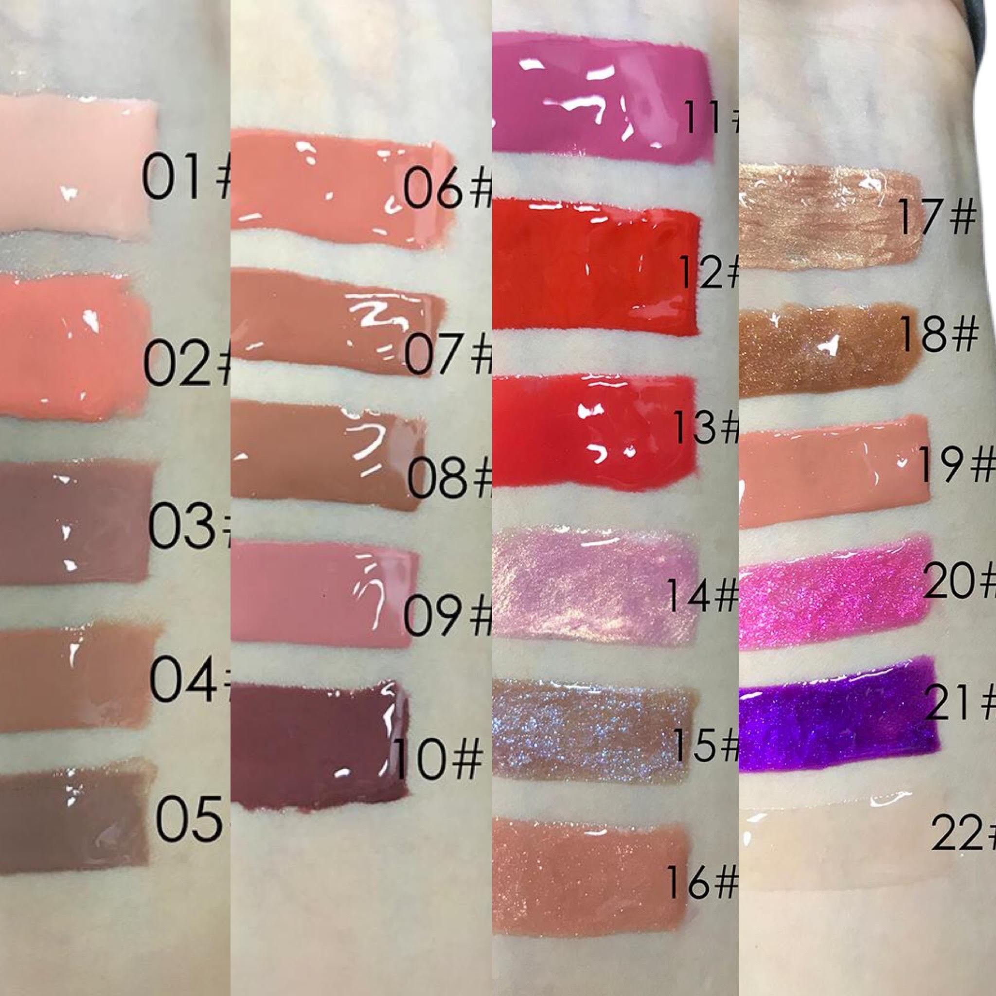 A collection of colorful Lip Gloss Tubes for the Lips of An Angel, showcasing various shades including blue, pink, nude, and red, designed for high-impact shine.