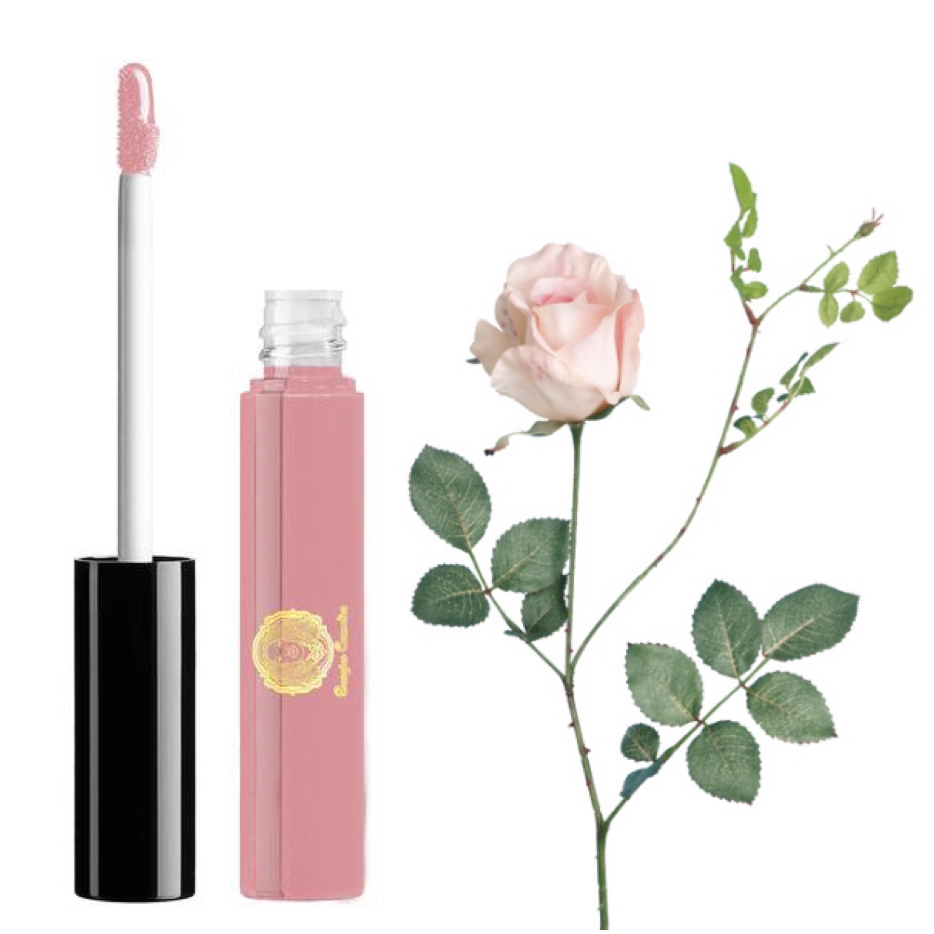 Nearly Naked Lipgloss in Mid Tone Nude Pink with a glossy finish, showcasing its creme texture and elegant packaging.