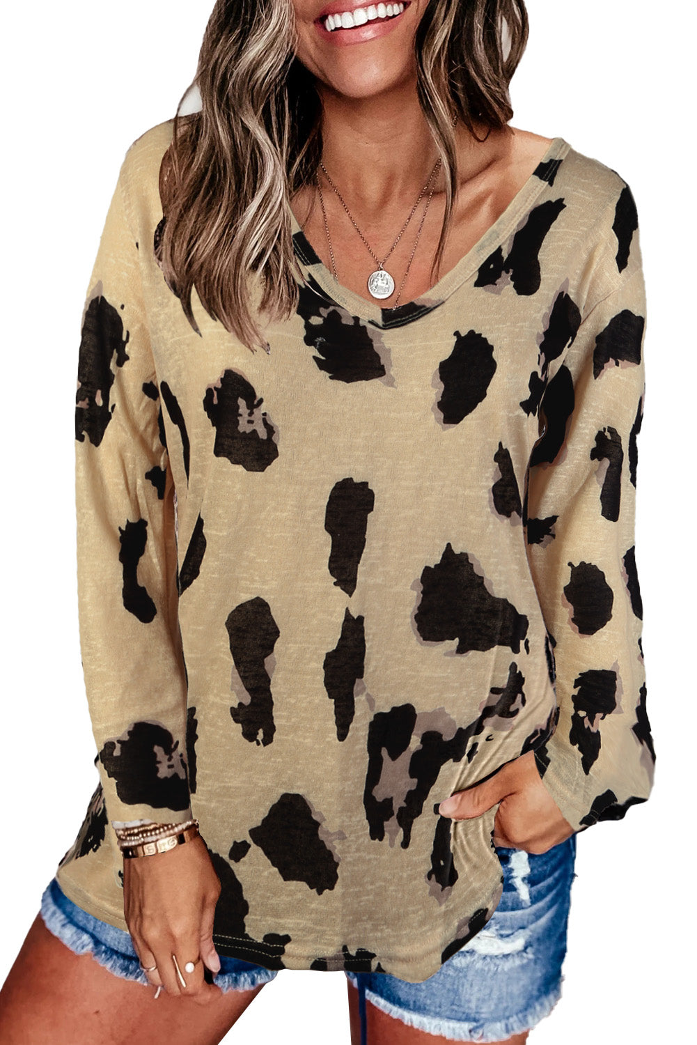 A stylish long sleeves leopard print blouse featuring a V-neck design and loose fit, perfect for casual and trendy outfits.