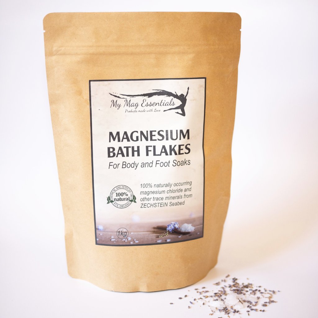 A 1kg bag of Magnesium Bath Flakes, featuring natural Magnesium Chloride from ZECHSTEIN Seabed, ideal for body and foot soaks.