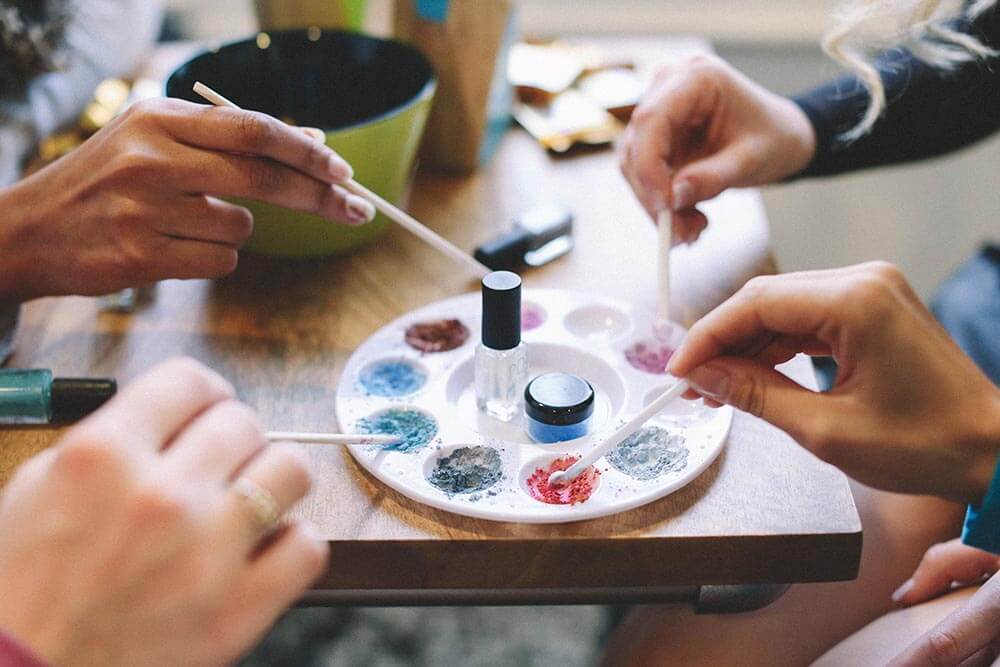 Make Your Own Nail Polish Kit in a limited edition tin with colorful pigments and tools for creating custom nail polish.