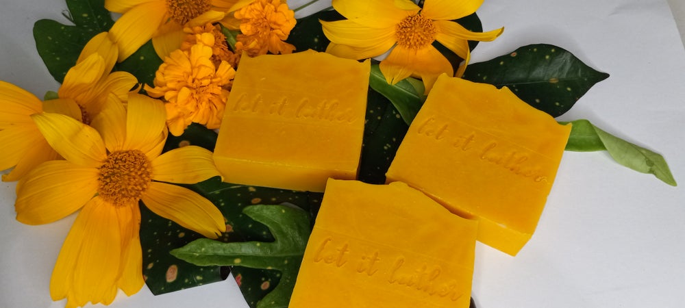 Mango Bath Soap bar with organic mango and sweet orange essential oil, showcasing its creamy texture and vibrant color.