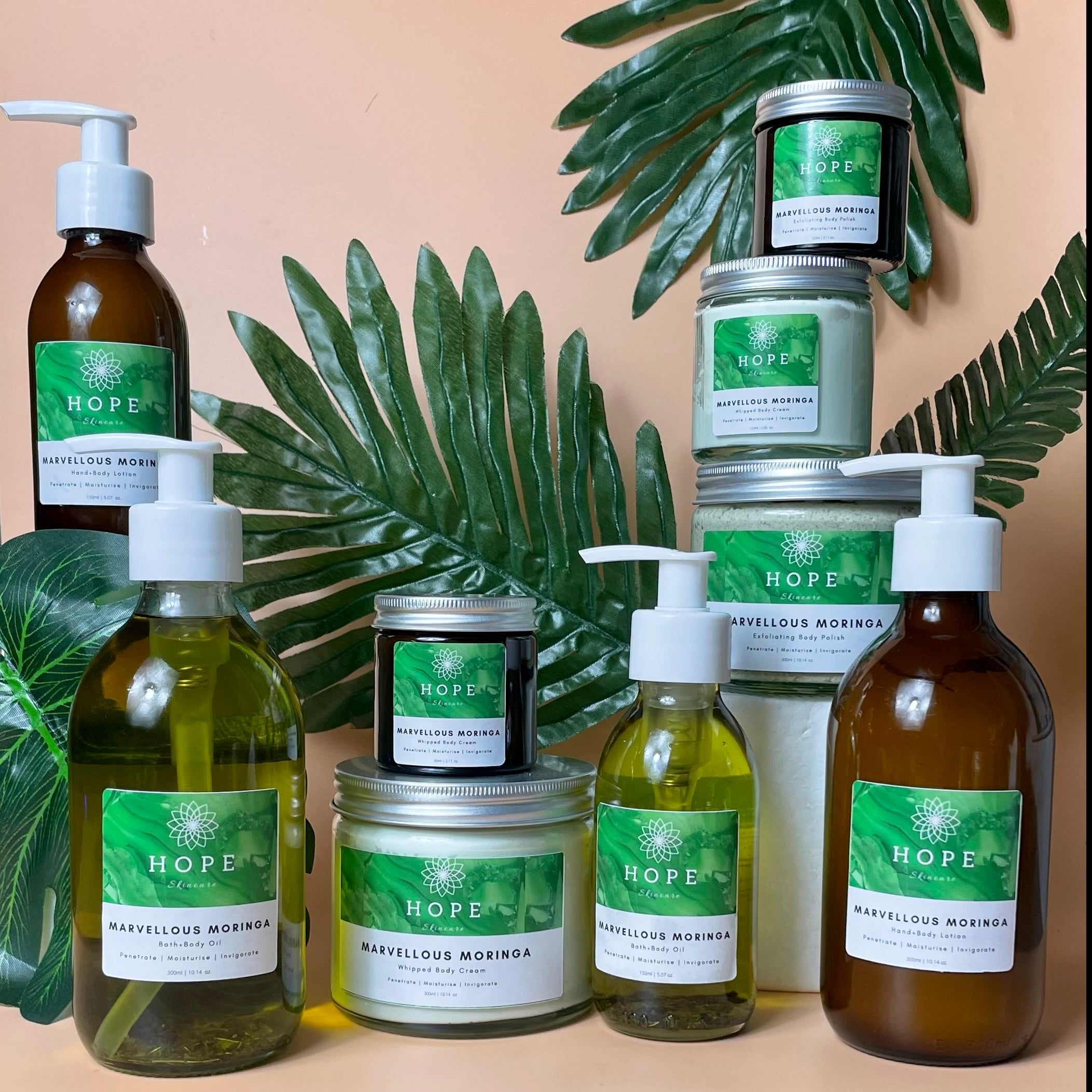 Marvellous Moringa skincare system including cleansing bar, body bar, cream, lotion, exfoliating polish, and body oil, all designed for healthy skin.