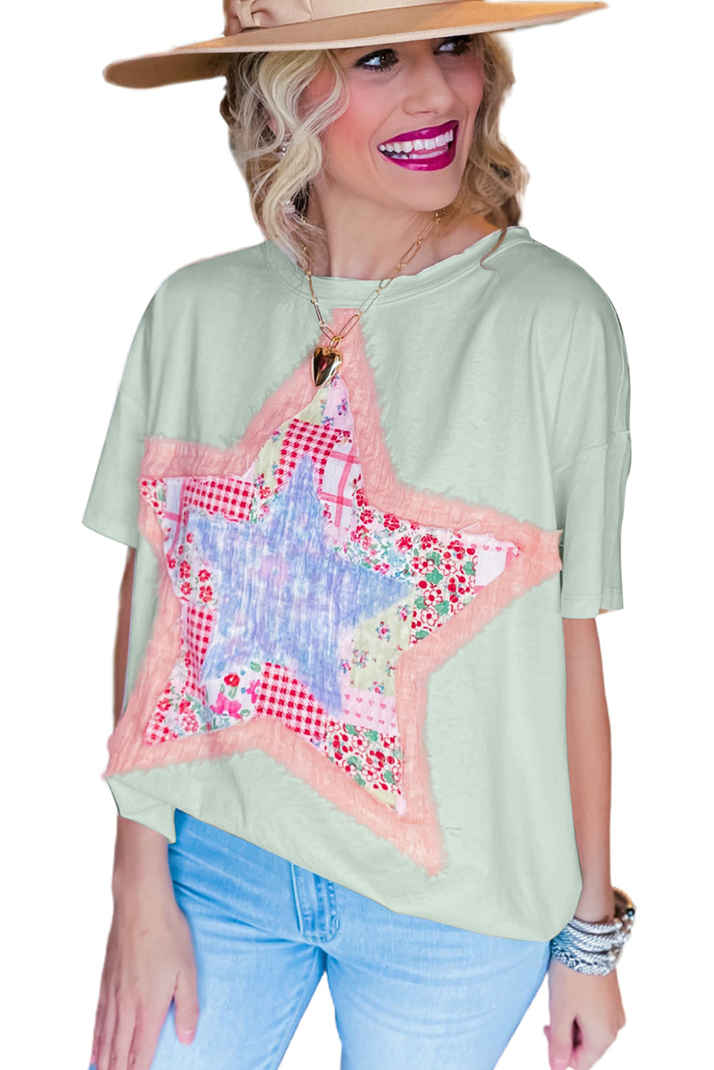 Meadow Mist Green Star Patchwork Loose T-shirt featuring a unique star design and a relaxed fit, perfect for casual wear.