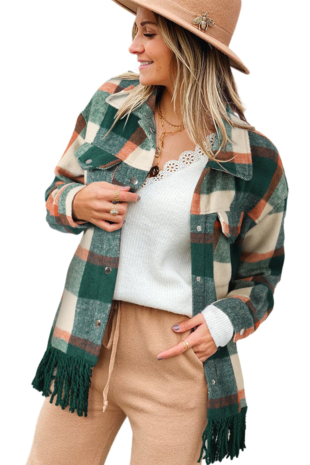 A stylish medium grey plaid jacket featuring a fringed hem, metal snap buttons, and two chest pockets, perfect for layering.