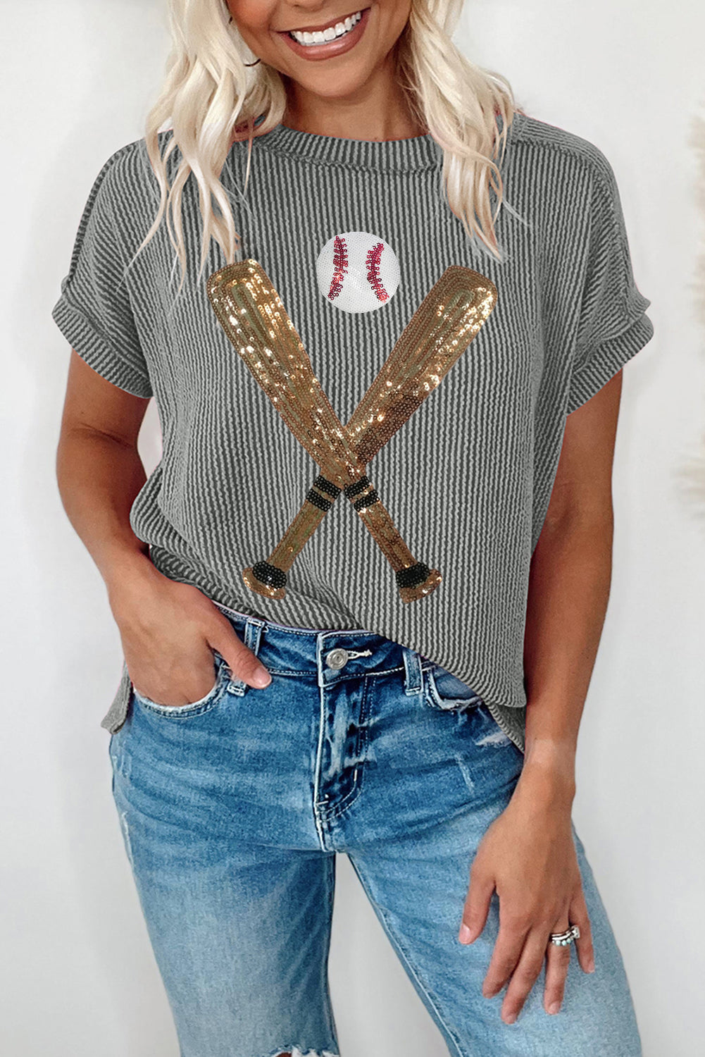 Medium grey ribbed knit crewneck t-shirt featuring a shiny sequin baseball pattern, perfect for stylish casual wear.