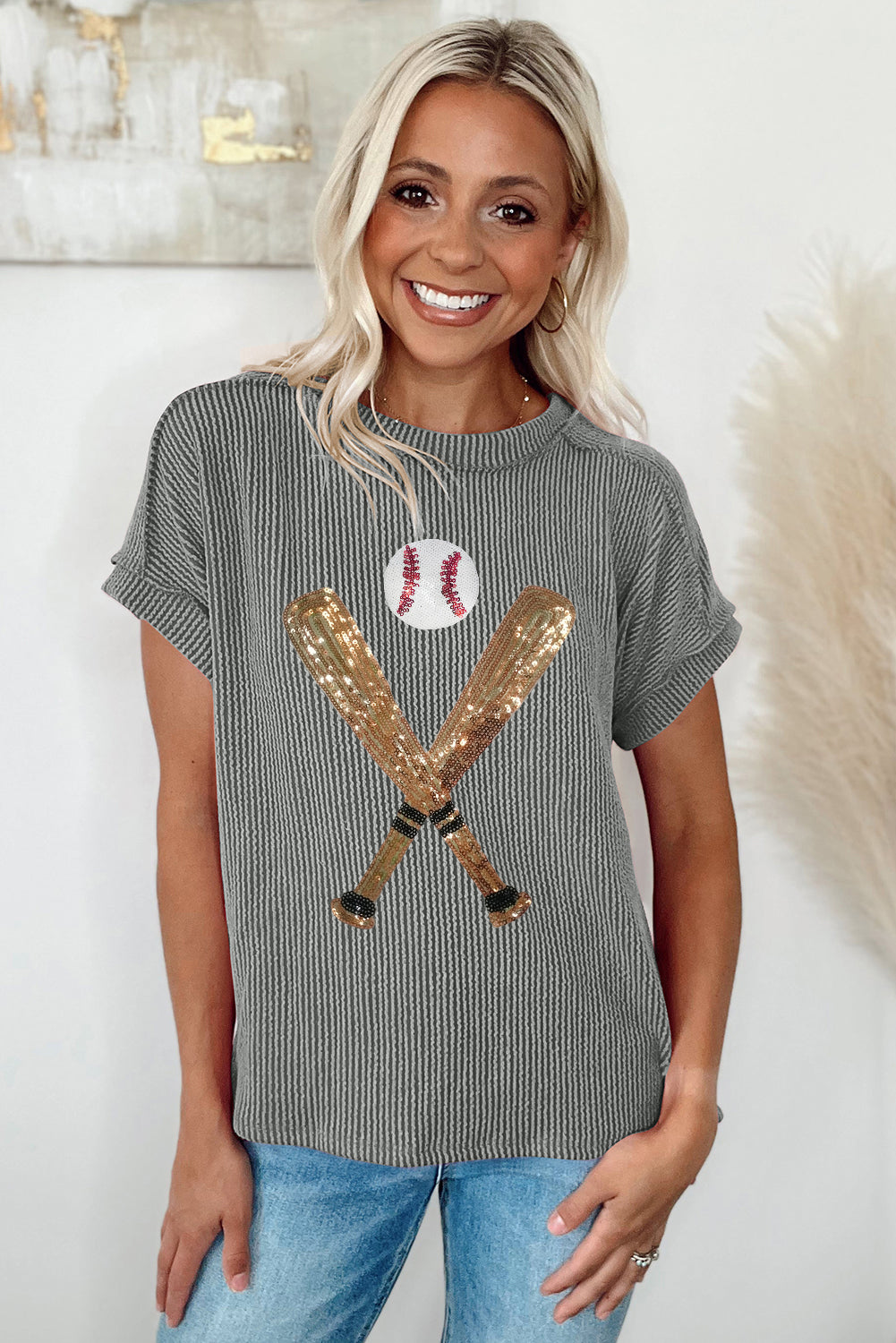 Medium grey ribbed knit crewneck t-shirt featuring a shiny sequin baseball pattern, perfect for stylish casual wear.