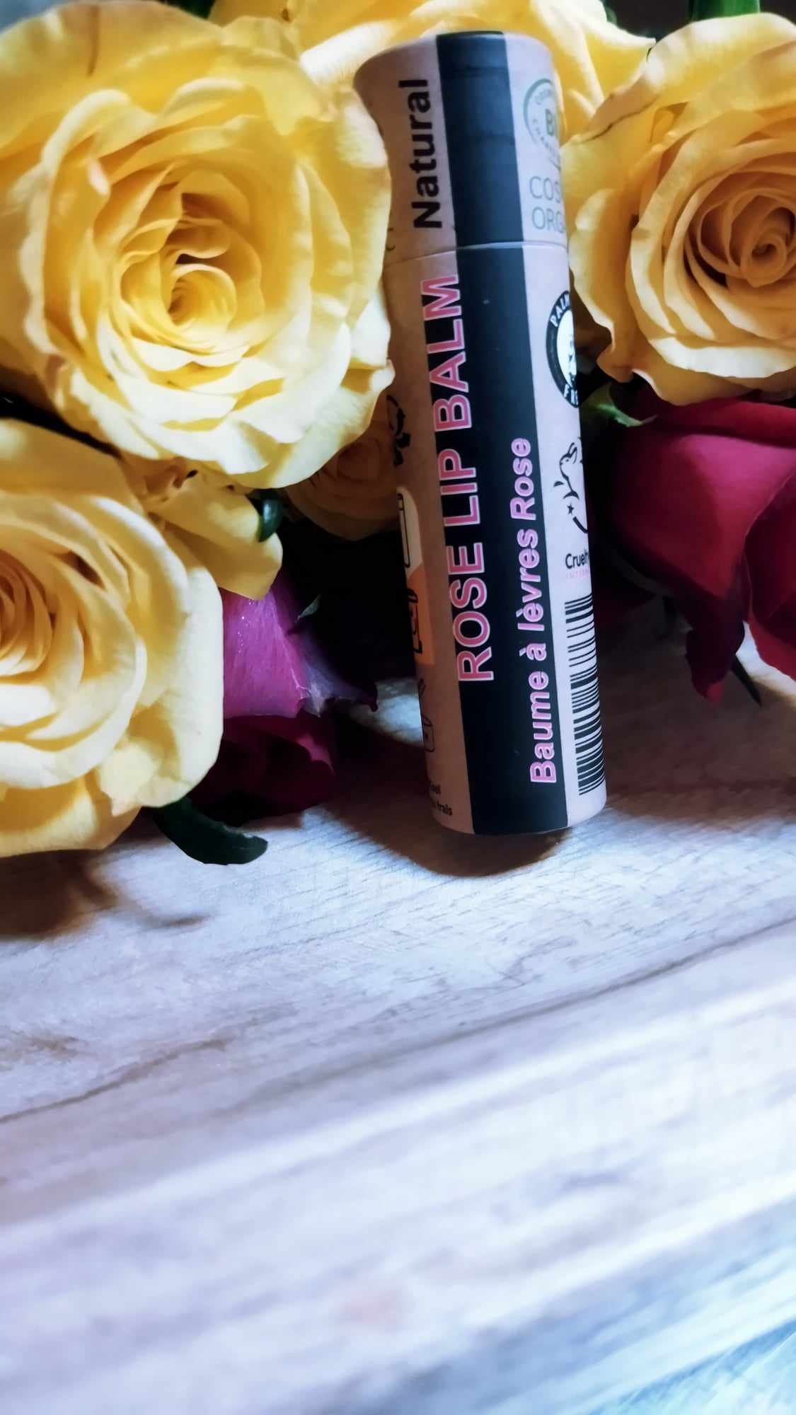 A collection of 30 tubes of 15ml Organic Rose Lip Balm, showcasing their eco-friendly packaging and natural ingredients.