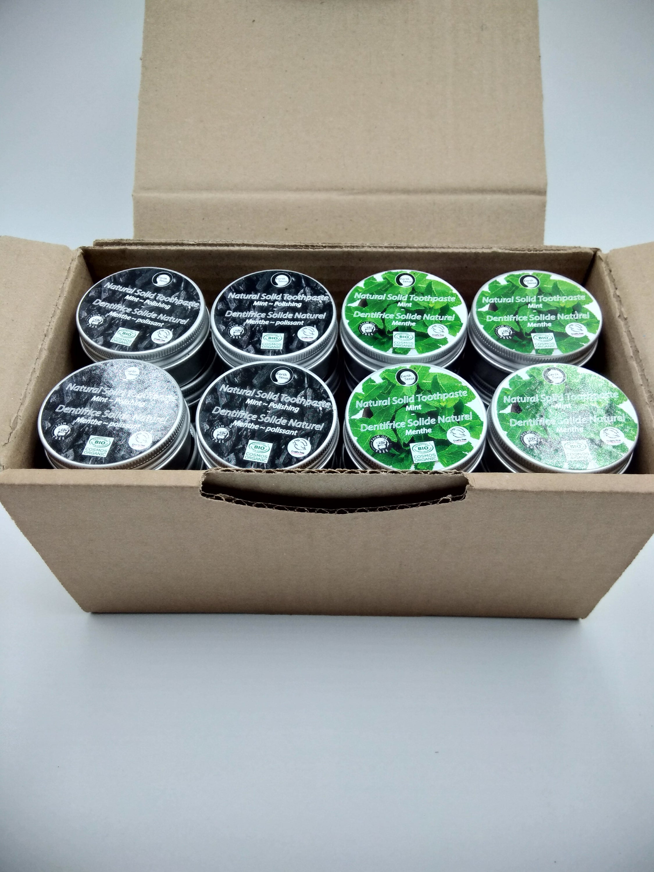 MEGA BUNDLE of 32 x 40g Natural Organic Certified Solid Toothpaste in aluminum tins, featuring Daily and Polishing variants.