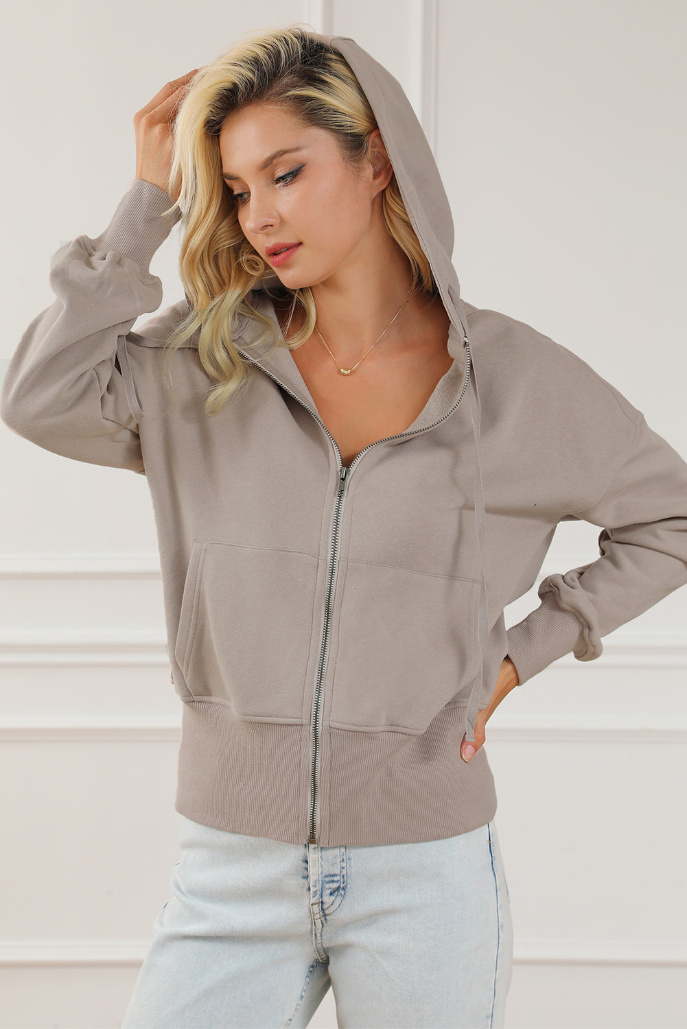 A stylish Mineral Wash Full Zip Drawstring Hoodie featuring a vintage look, front zipper, and practical pockets, perfect for casual wear.