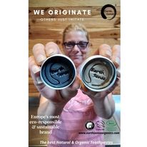 Four 40g tins of Natural Organic Certified Solid Toothpaste in mint flavor, packaged in recyclable aluminum tins.