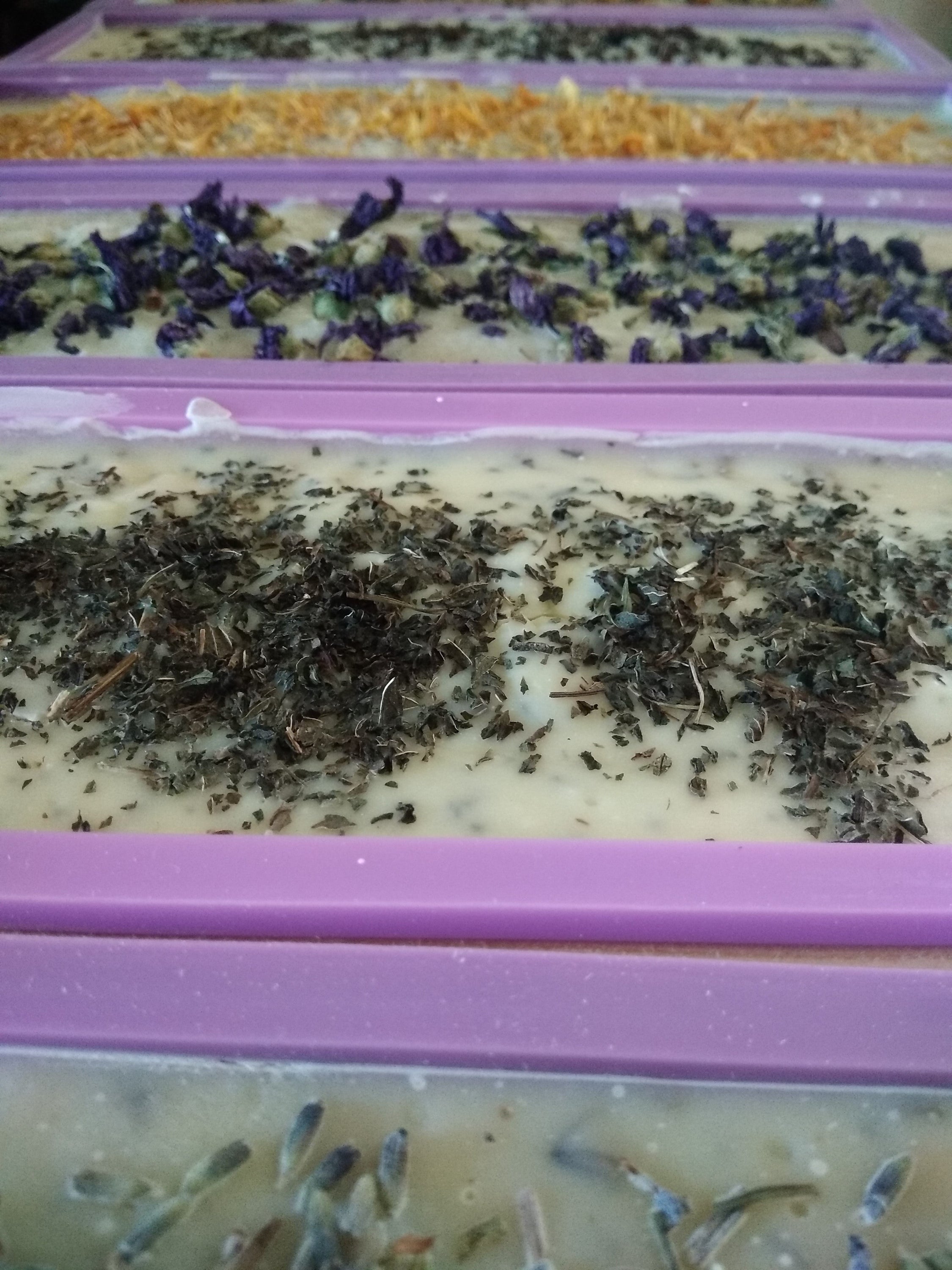 MINI BUNDLE of 4 x 90g Organic Certified Solid Soap featuring Lavender and Mint scents with shredded mint leaves, beautifully packaged.