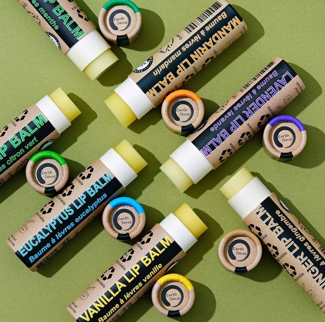 Four 15ml tubes of Organic Ginger Lip Balm in eco-friendly packaging, showcasing natural ingredients.