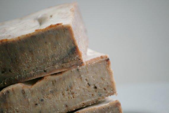 Mocha Latte Soap bar featuring a rich brown color with visible coffee grounds, showcasing its natural ingredients and handmade quality.