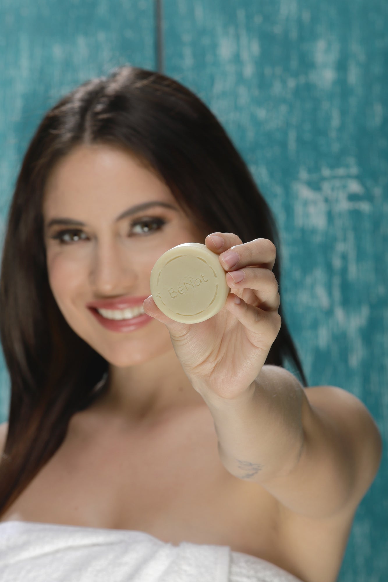 Moisturizing Lotion Bar in a reusable metal tin, showcasing its natural ingredients and eco-friendly packaging.