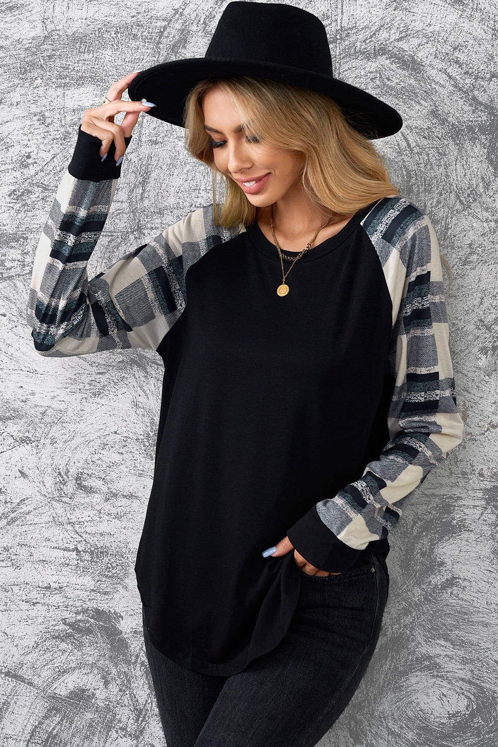 Monochrome plaid long sleeves black pullover top featuring colorblocked sleeves and a round neckline, perfect for casual and stylish outfits.