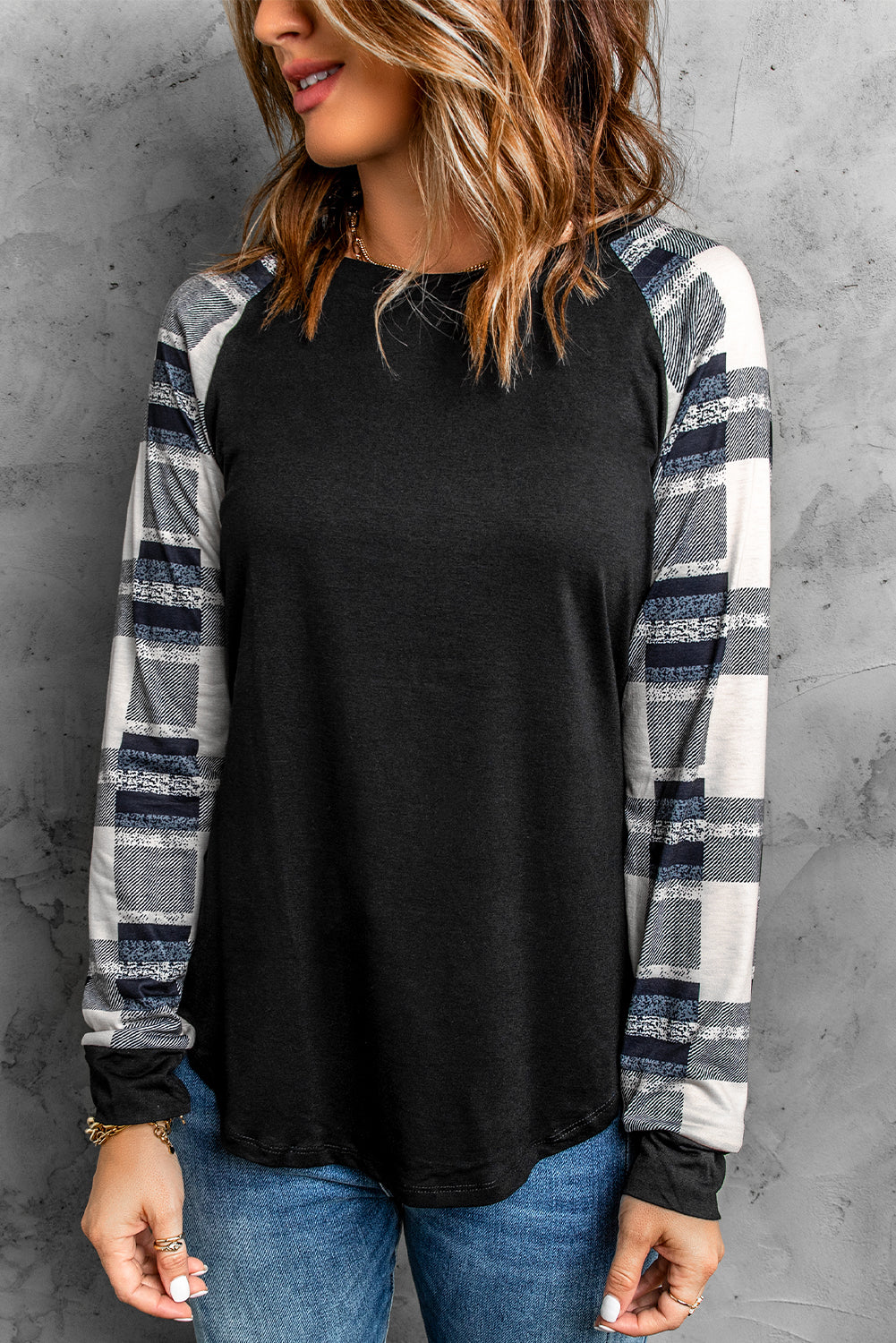 Monochrome plaid long sleeves black pullover top featuring colorblocked sleeves and a round neckline, perfect for casual and stylish outfits.