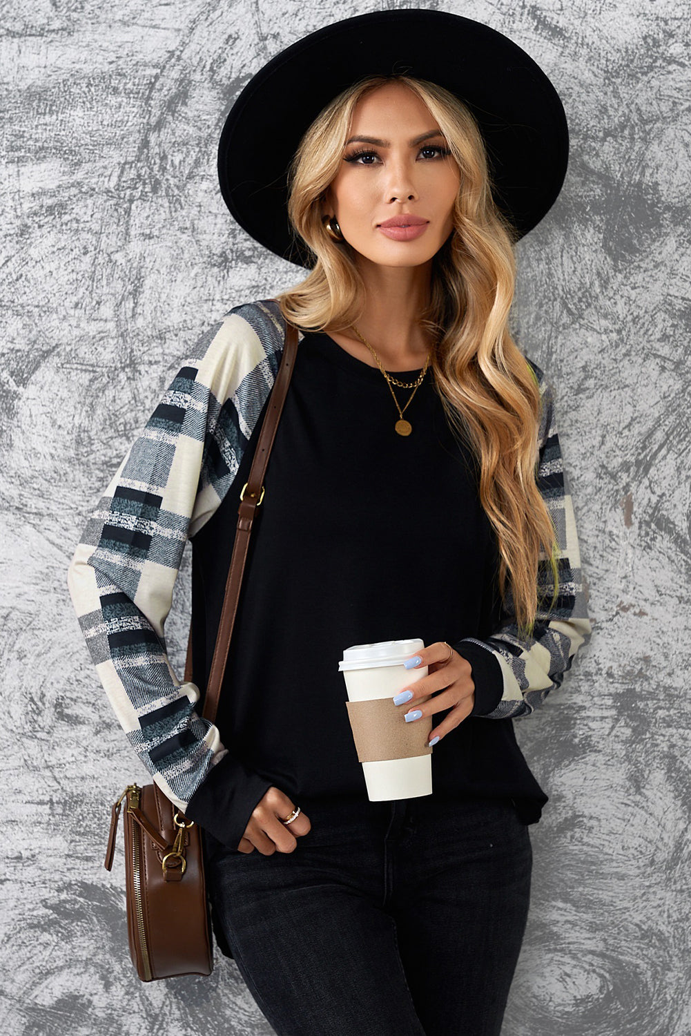 Monochrome plaid long sleeves black pullover top featuring colorblocked sleeves and a round neckline, perfect for casual and stylish outfits.