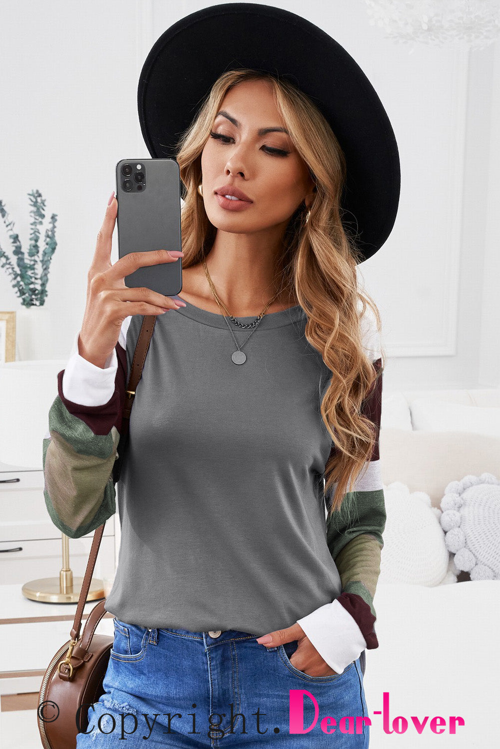 Monochrome plaid long sleeves black pullover top featuring colorblocked sleeves and a round neckline, perfect for casual and stylish outfits.