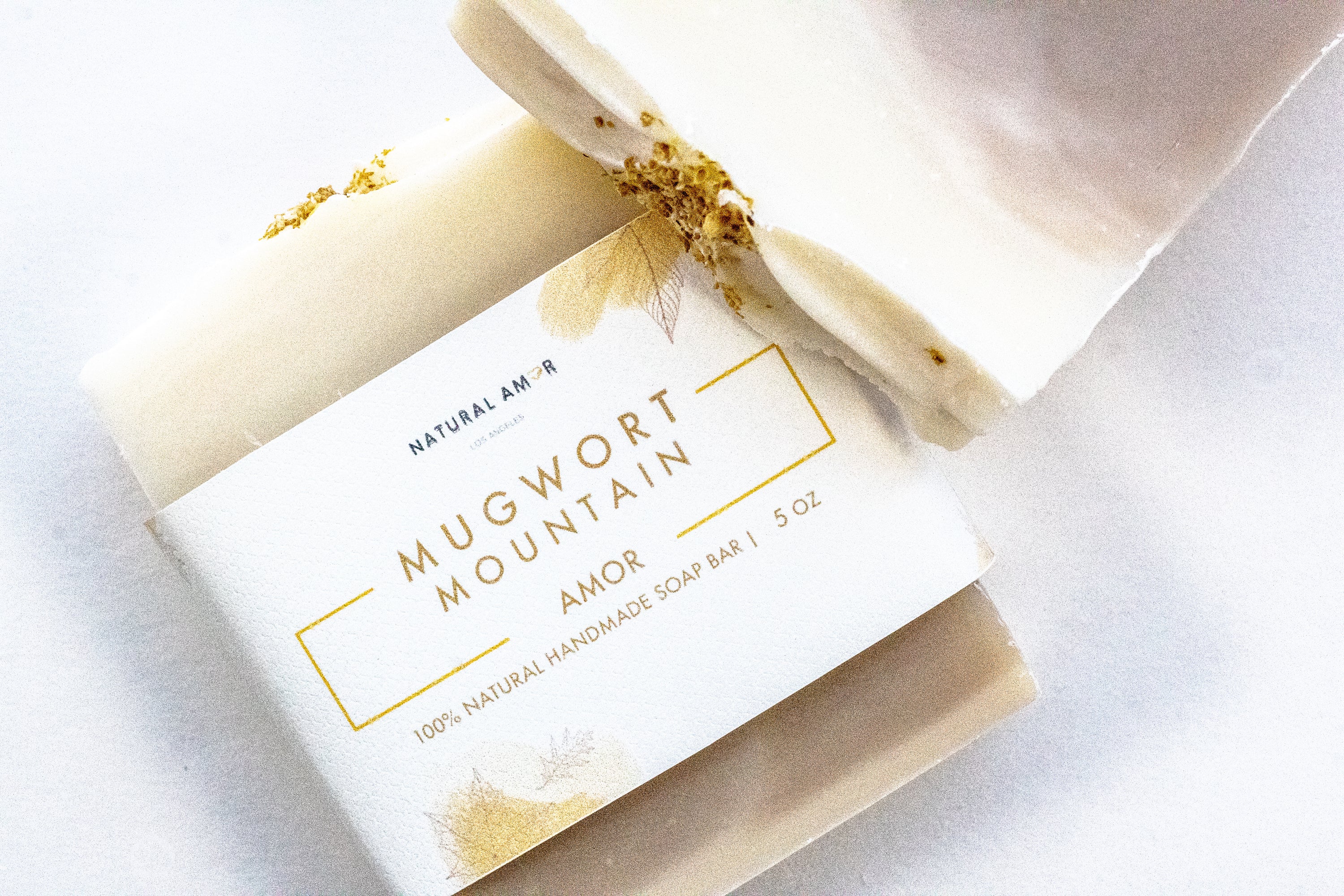 Mugwort Mountain Soap Bar with natural herbal ingredients and essential oils, showcasing its earthy color and texture.