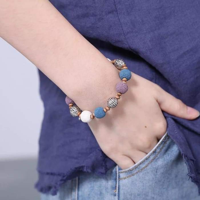 Multi Color Lava Stone Bracelet 4 featuring vibrant lava stones designed for essential oil absorption.