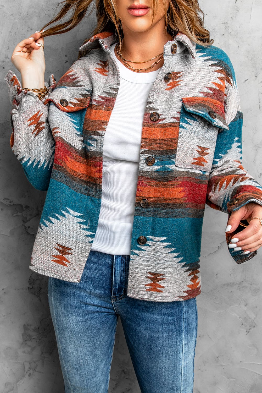 Multicolor Aztec Print Lapel Button Shirt Jacket featuring geometric patterns and two chest flap pockets, styled casually.