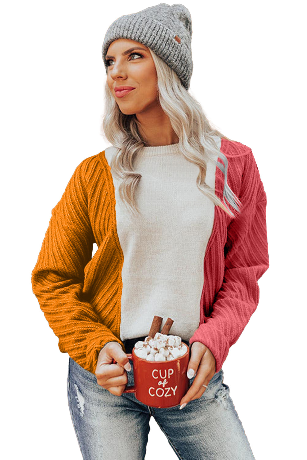 A stylish multicolor colorblock textured drop shoulder sweater displayed on a mannequin, showcasing its unique design and cozy fabric.