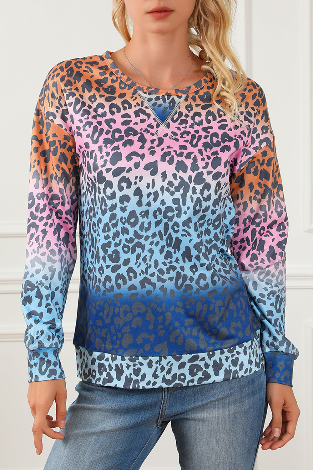 Multicolor gradient leopard print pullover sweatshirt showcasing vibrant colors and stylish design, perfect for casual wear.