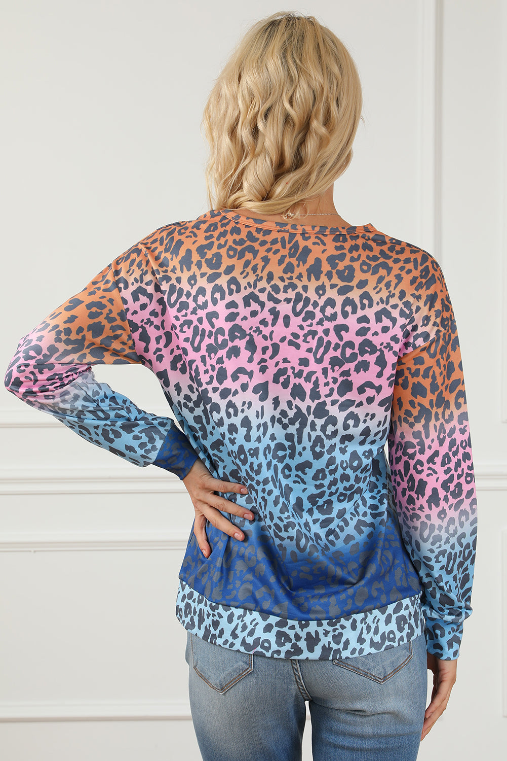 Multicolor gradient leopard print pullover sweatshirt showcasing vibrant colors and stylish design, perfect for casual wear.