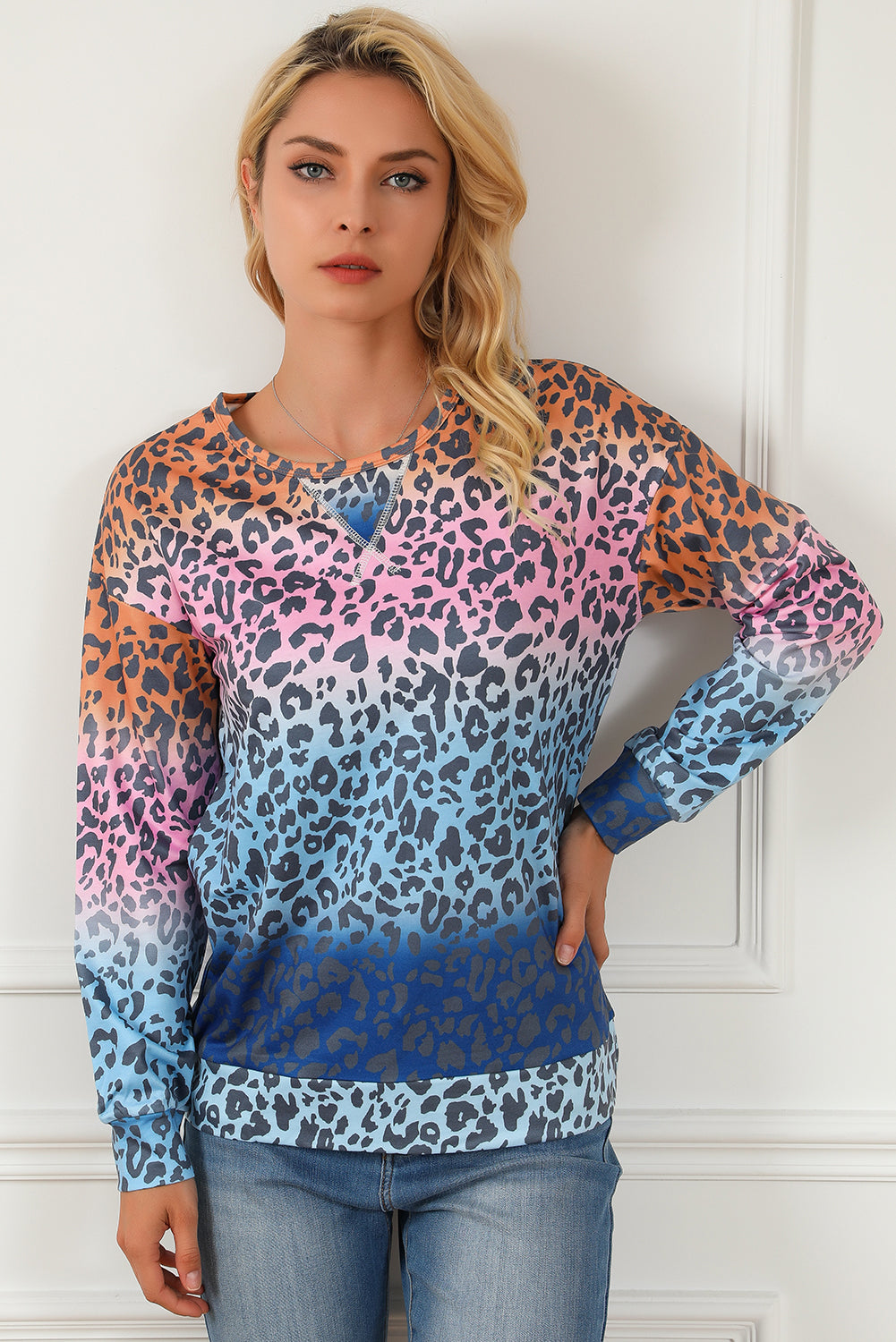 Multicolor gradient leopard print pullover sweatshirt showcasing vibrant colors and stylish design, perfect for casual wear.