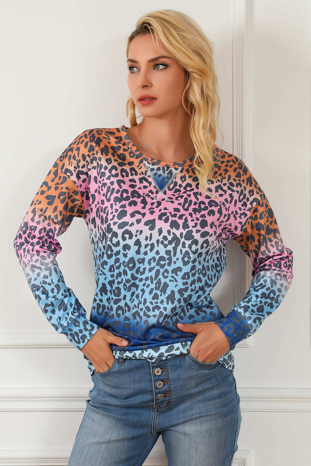 Multicolor gradient leopard print pullover sweatshirt showcasing vibrant colors and stylish design, perfect for casual wear.