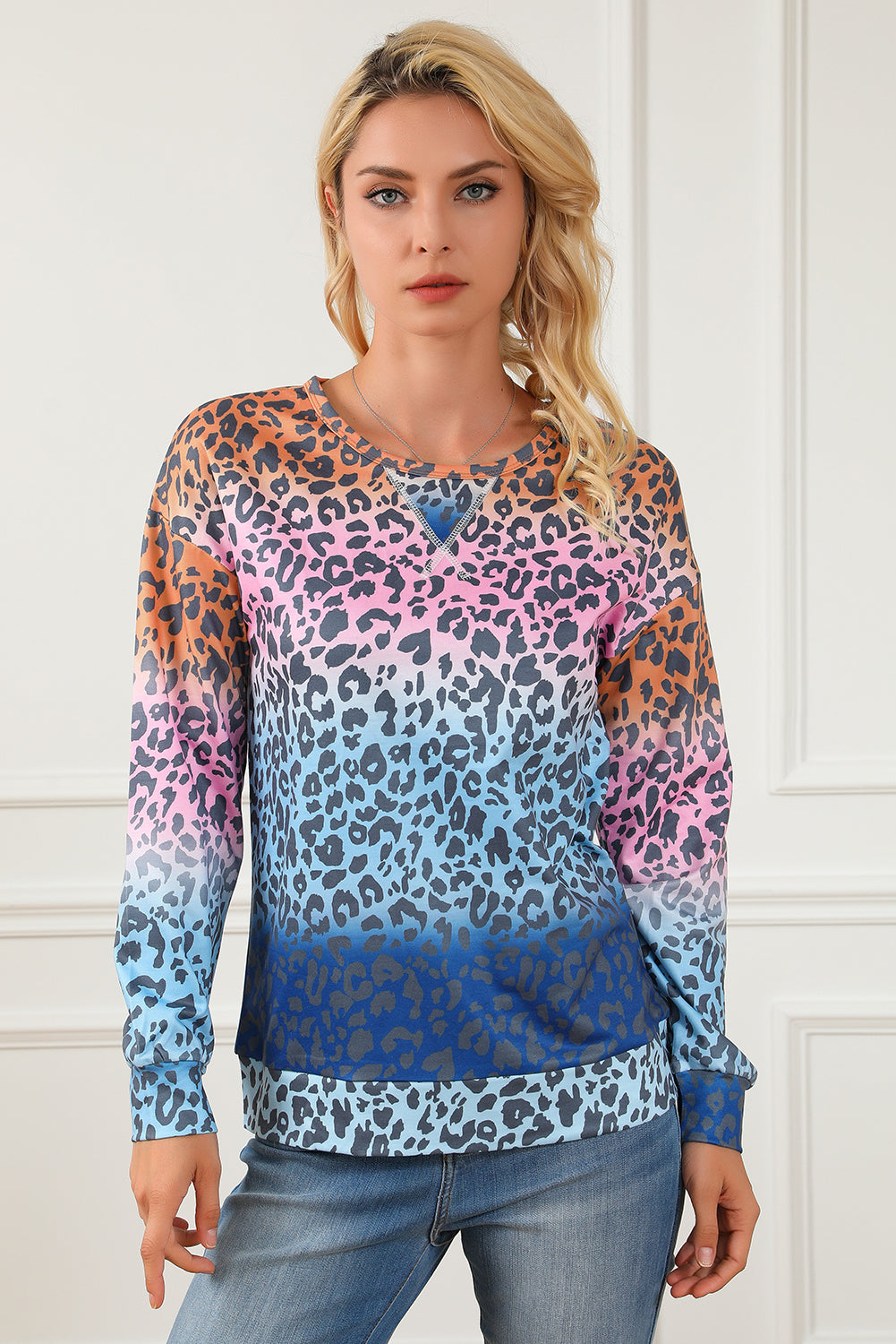 Multicolor gradient leopard print pullover sweatshirt showcasing vibrant colors and stylish design, perfect for casual wear.