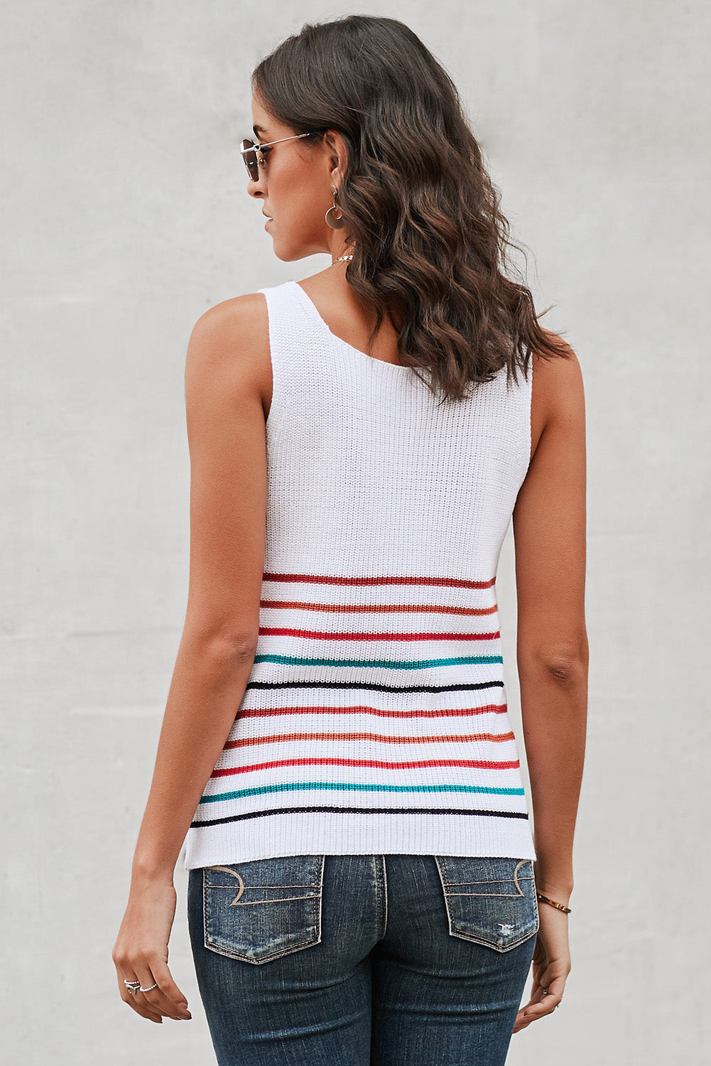 Multicolor Stripes White Knit Tank Top featuring a v-neck and sleeveless design, showcasing vibrant stripes on a white background.