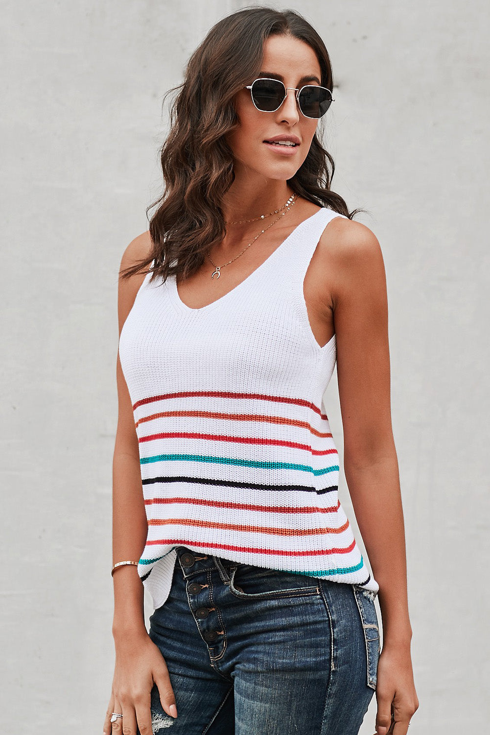 Multicolor Stripes White Knit Tank Top featuring a v-neck and sleeveless design, showcasing vibrant stripes on a white background.