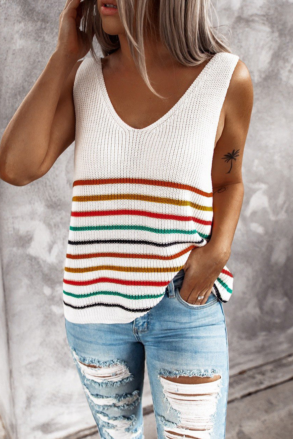 Multicolor Stripes White Knit Tank Top featuring a v-neck and sleeveless design, showcasing vibrant stripes on a white background.