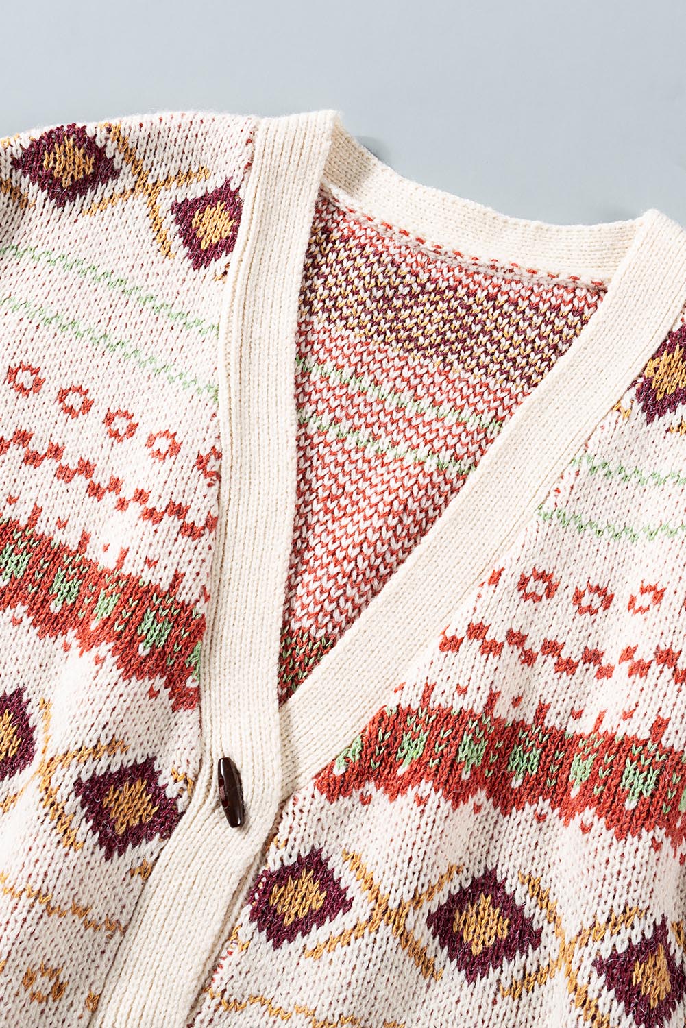 Multicolor Tribal Pattern V Neck Button Front Cardigan featuring a relaxed fit and thick knit fabric, perfect for layering.