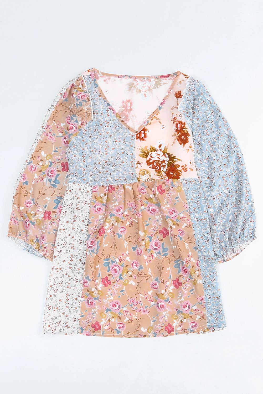 A stylish multicolor V neck babydoll top featuring a mixed floral print, perfect for casual wear.